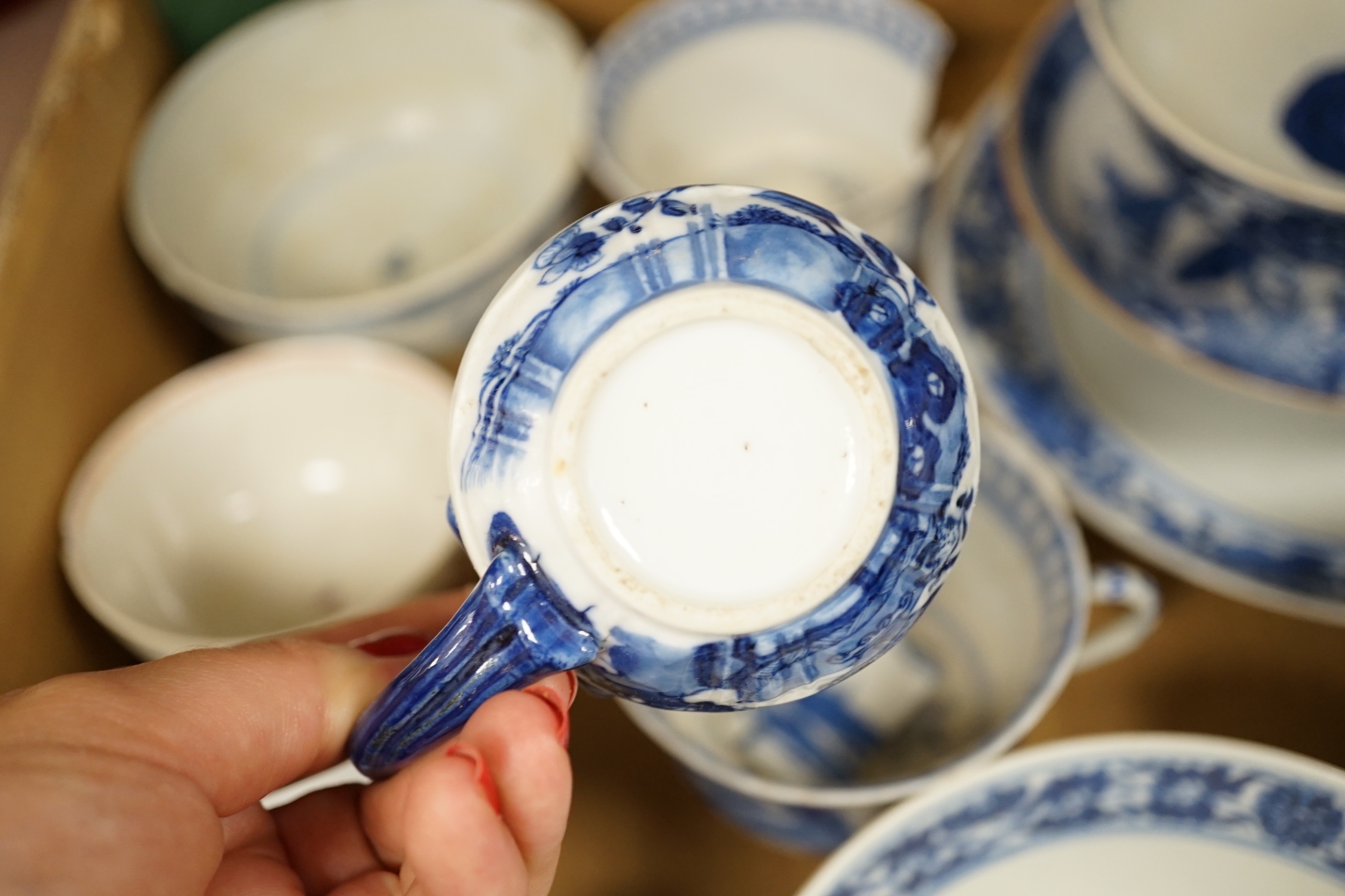 A collection of mostly Chinese blue and white bowls, plates, cups etc. 18th to early 20th century